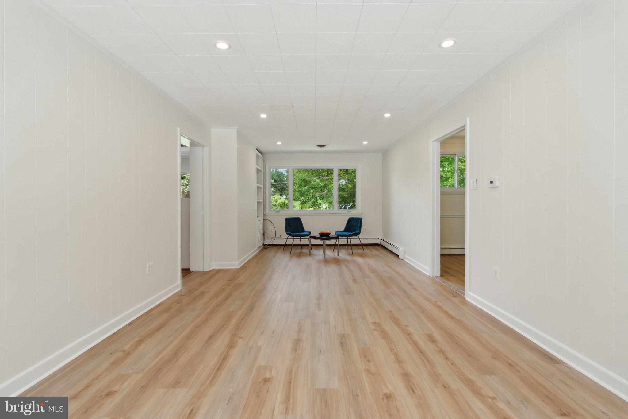 701 Notley Road Silver Spring, MD 20904 - Photo 24 of 60 wooden floor in an empty room with a window