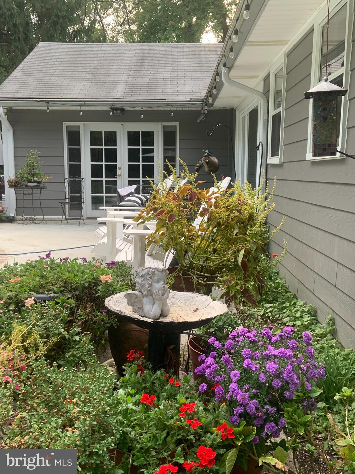 701 Notley Road Silver Spring, MD 20904 - Photo 38 of 60 a front view of a house with a yard and fountain