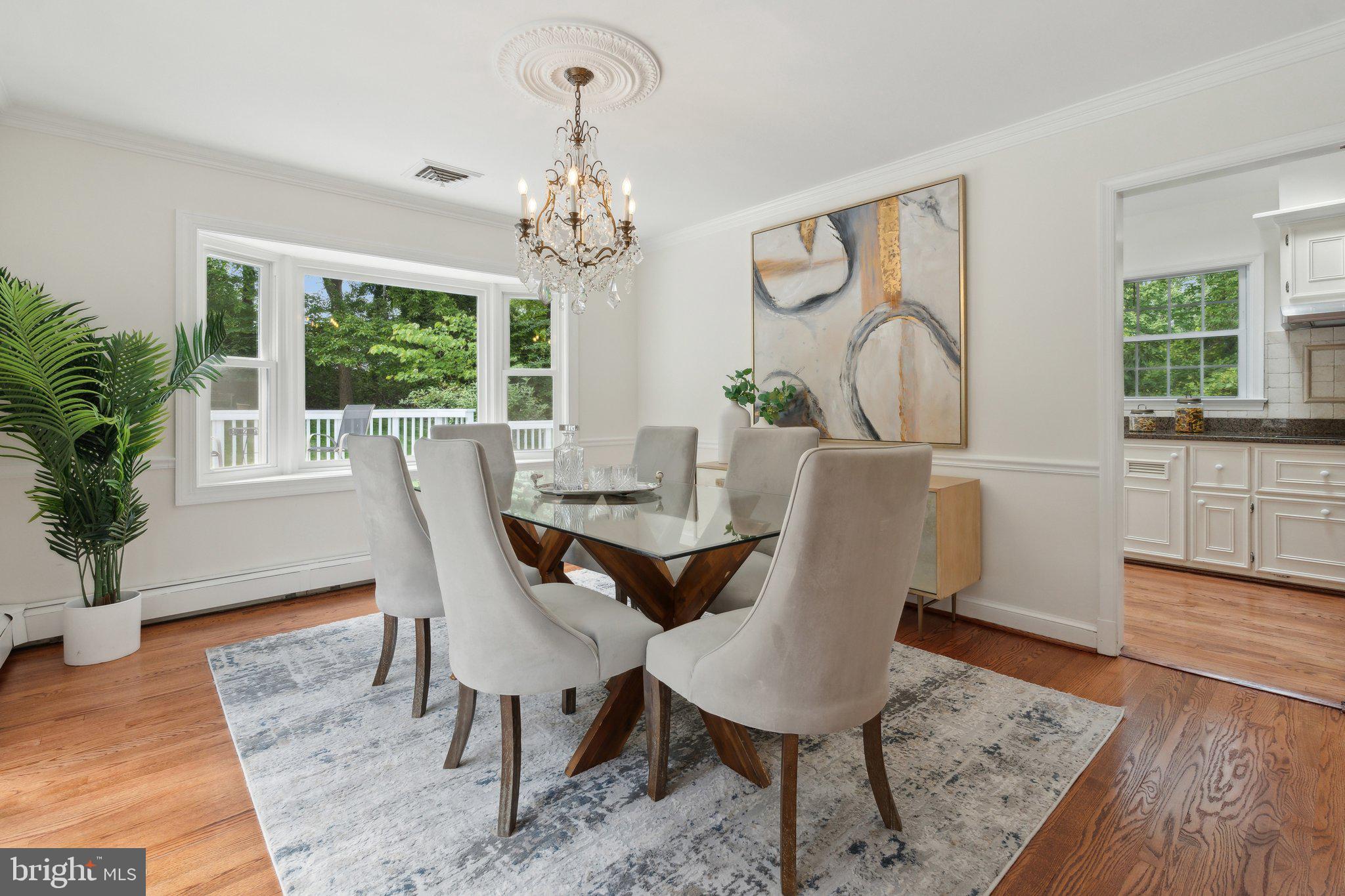 701 Notley Road Silver Spring, MD 20904 - Photo 5 of 60 a view of a dining room with furniture window and wooden floor