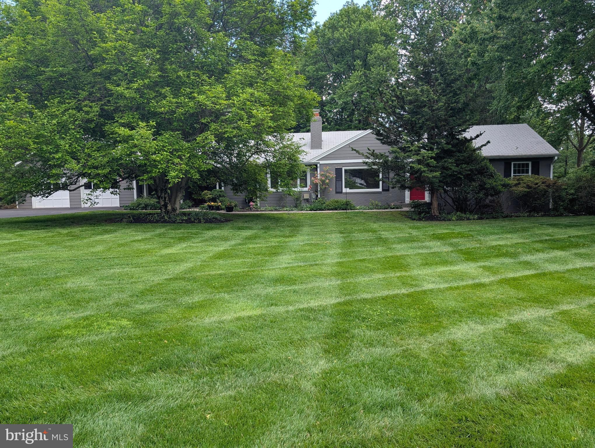 701 Notley Road Silver Spring, MD 20904 - Photo 54 of 60 a front view of a house with a garden