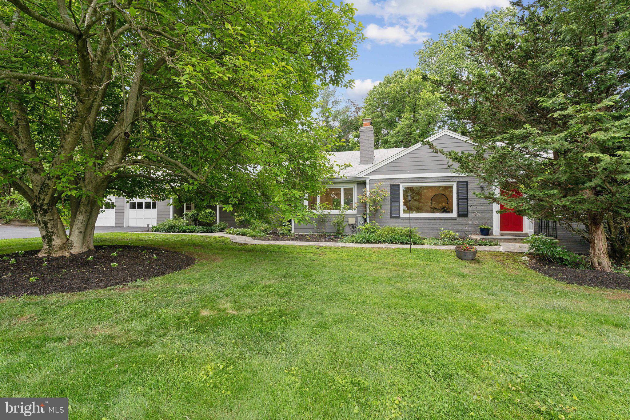 701 Notley Road Silver Spring, MD 20904 - Photo 9 of 60 a front view of a house with a yard