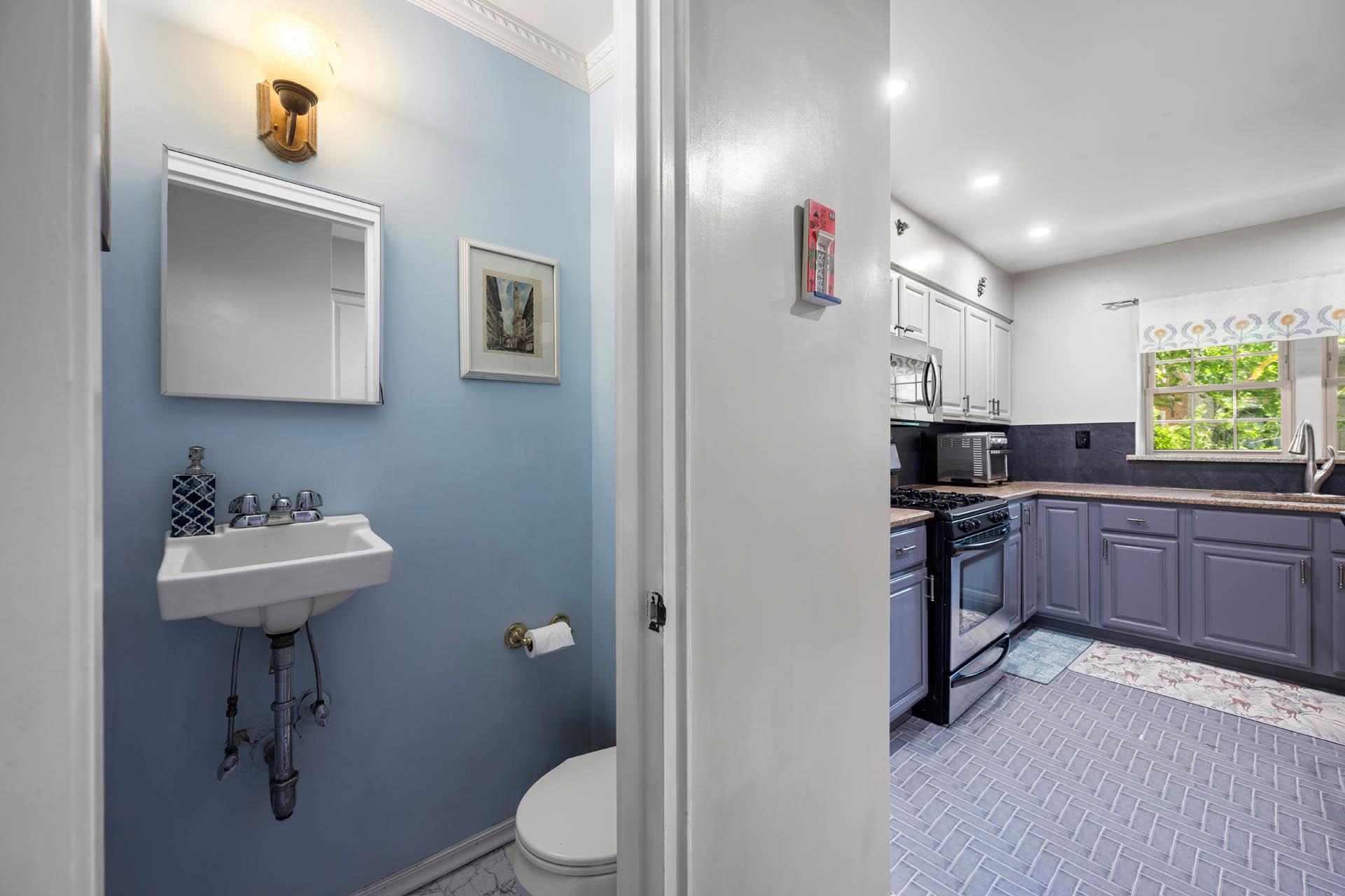 5922 Post Road Bronx, NY 10471 - Photo 4 of 13 Bathroom featuring a sink, toilet, tasteful backsplash, recessed lighting, and ornamental molding