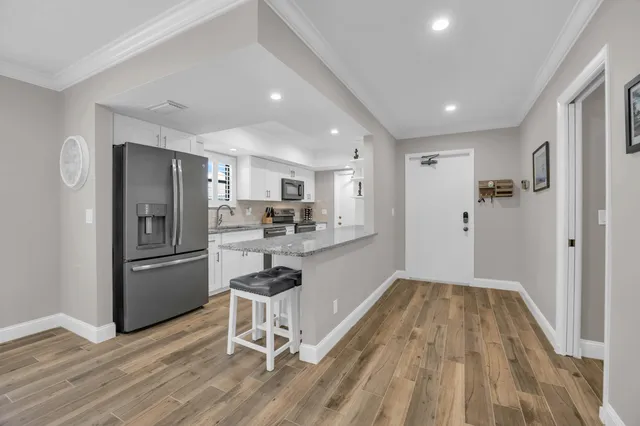 $449,000 | 24 Southeast Turtle Creek Drive, Unit F, Tequesta, FL 33469