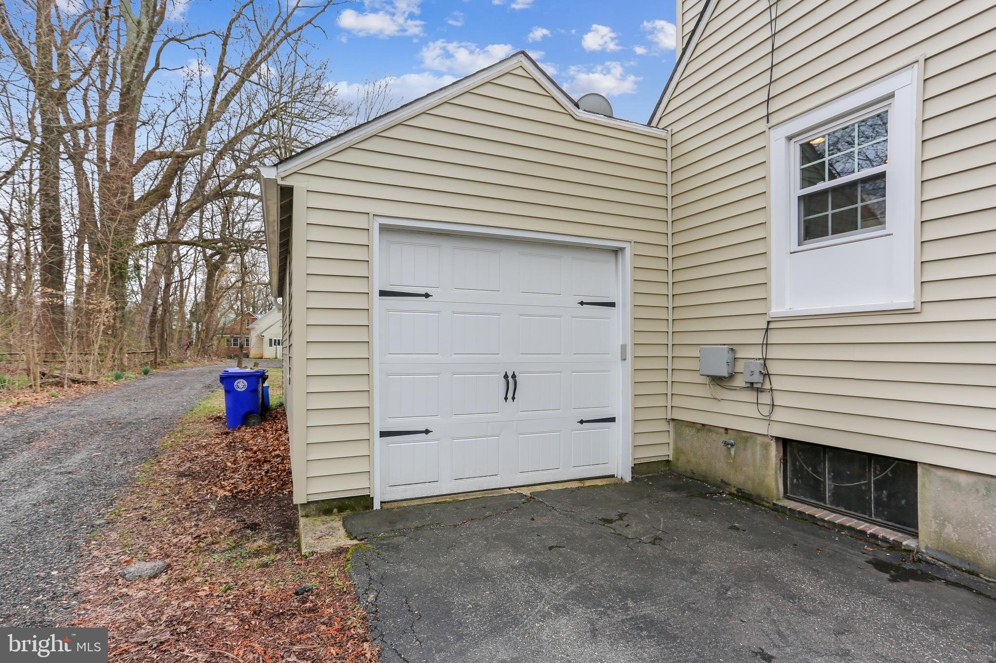 616 Olney Sandy Spring Road Sandy Spring, MD 20860 - Photo 29 of 31 a view of a house with a yard and fire pit