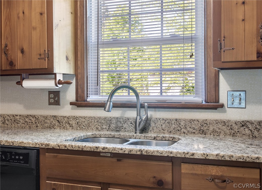 4061 Falstone Road North Chesterfield, VA 23234 - Photo 14 of 33 a kitchen with granite countertop a sink and a window