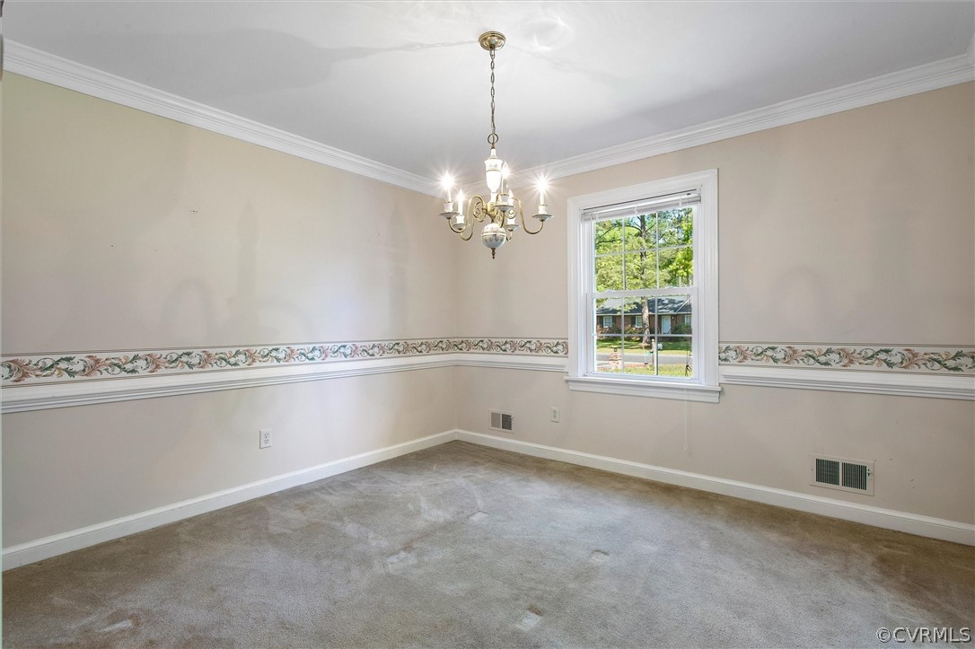 4061 Falstone Road North Chesterfield, VA 23234 - Photo 18 of 33 a view of a kitchen with cabinets and chandelier