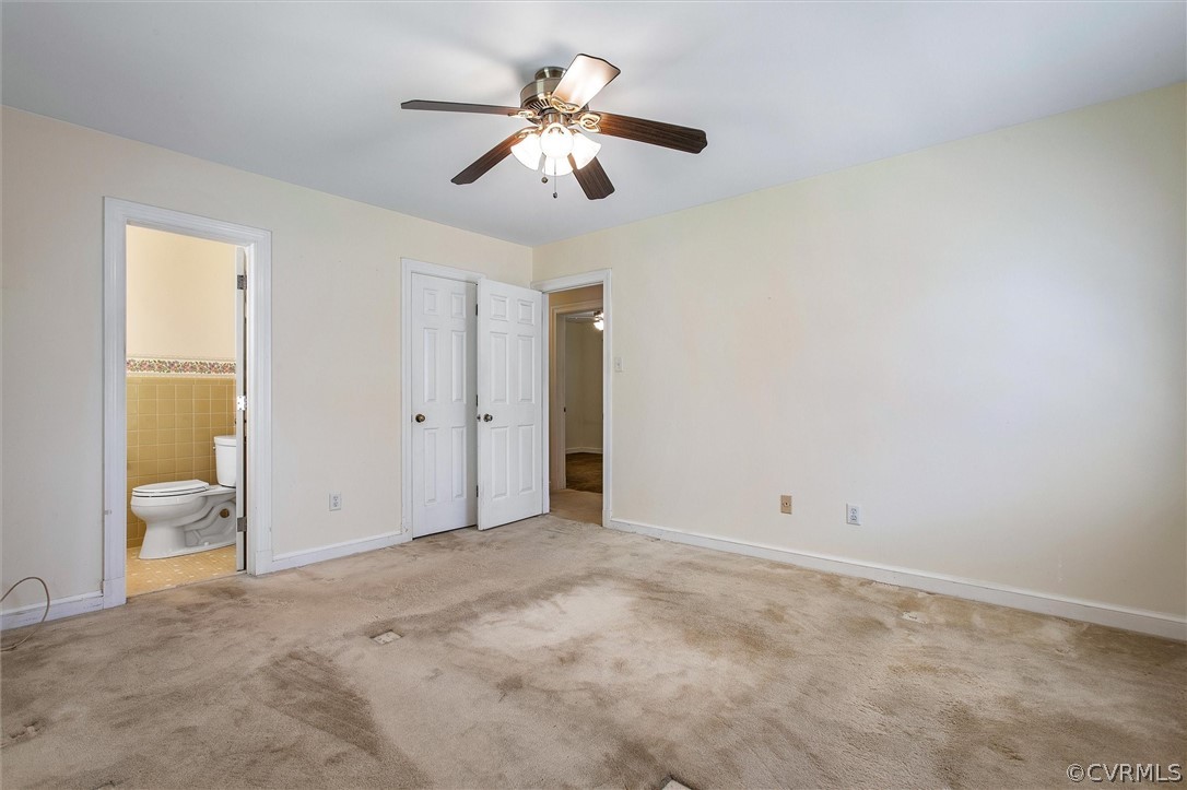 4061 Falstone Road North Chesterfield, VA 23234 - Photo 23 of 33 an empty room with closet and a chandelier fan