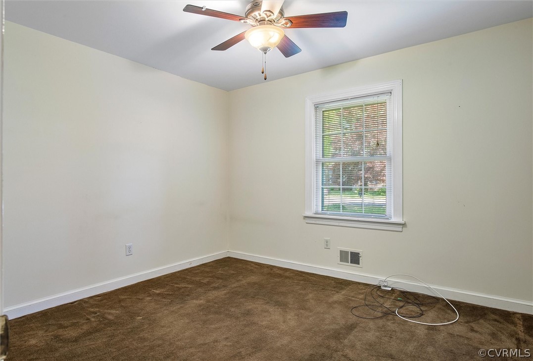 4061 Falstone Road North Chesterfield, VA 23234 - Photo 26 of 33 an empty room with a window and a fan