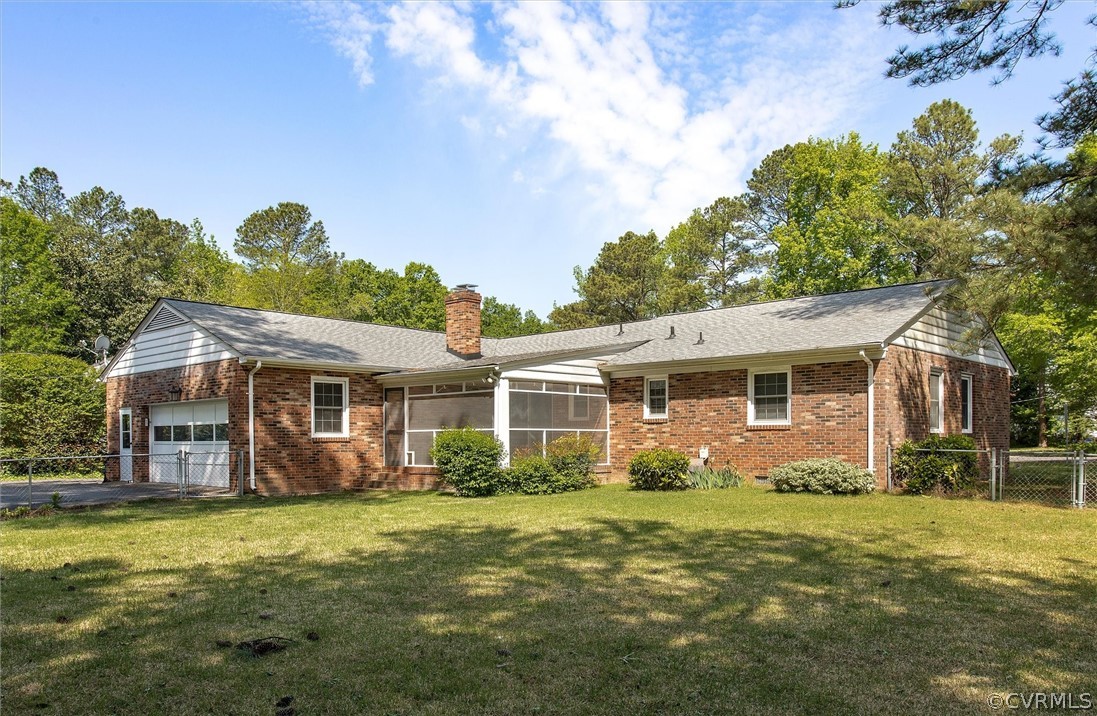 4061 Falstone Road North Chesterfield, VA 23234 - Photo 33 of 33 a view of a house with backyard and garden