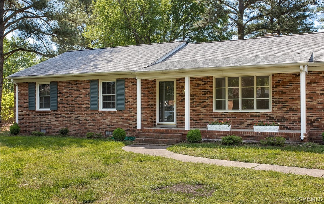 4061 Falstone Road North Chesterfield, VA 23234 - Photo 4 of 33 a front view of a house with a yard