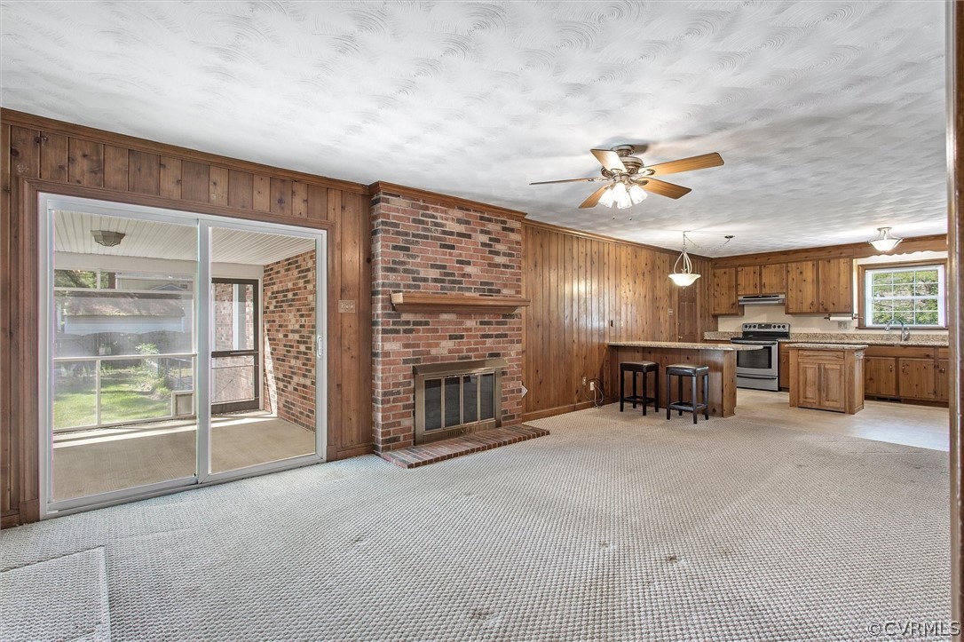 4061 Falstone Road North Chesterfield, VA 23234 - Photo 7 of 33 a view of a livingroom with furniture and a fireplace