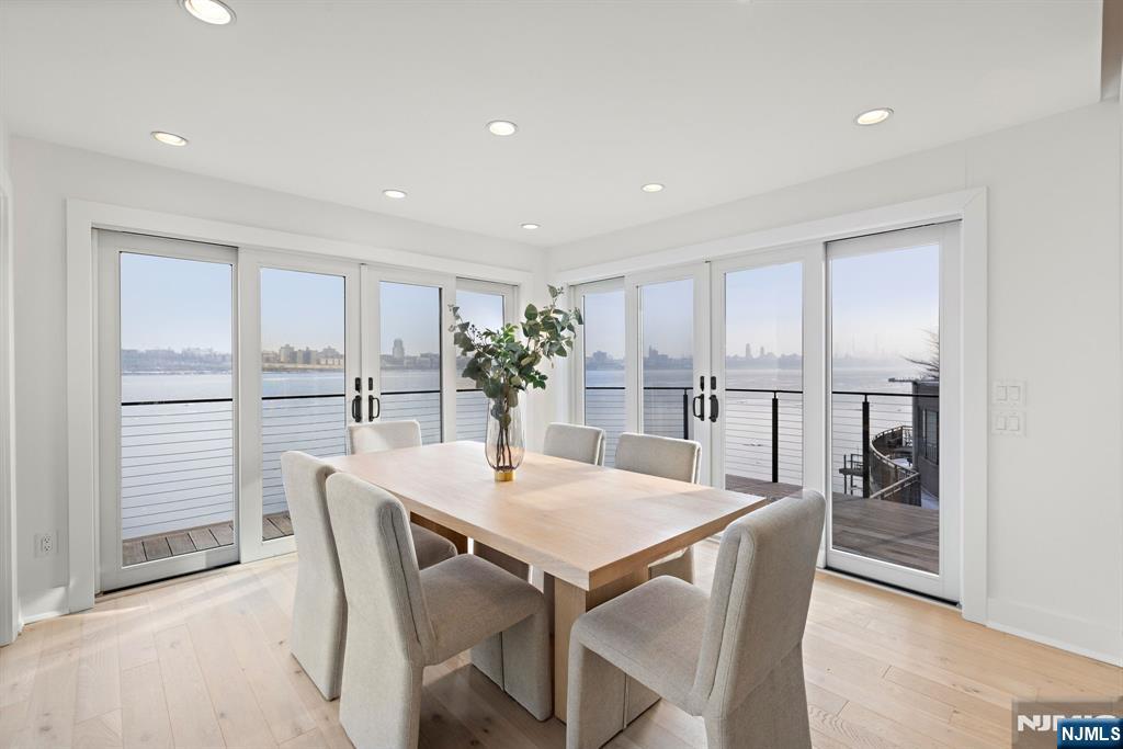 27 Shore Road Edgewater, NJ 07020 - Photo 13 of 48 a view of a dining room with furniture and a window