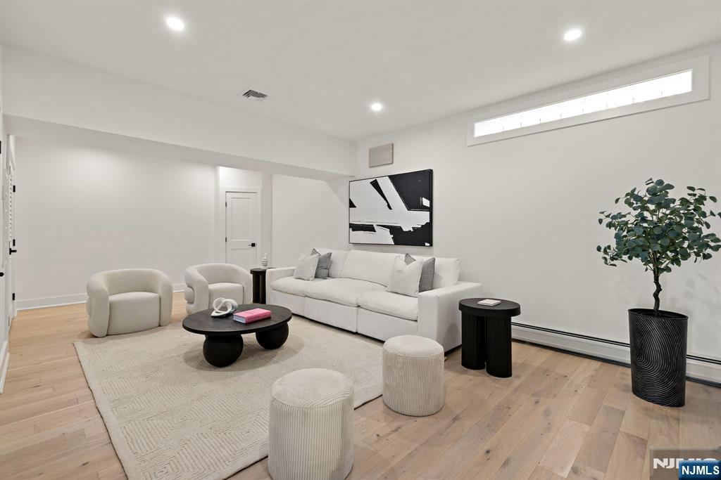 27 Shore Road Edgewater, NJ 07020 - Photo 22 of 48 a living room with furniture