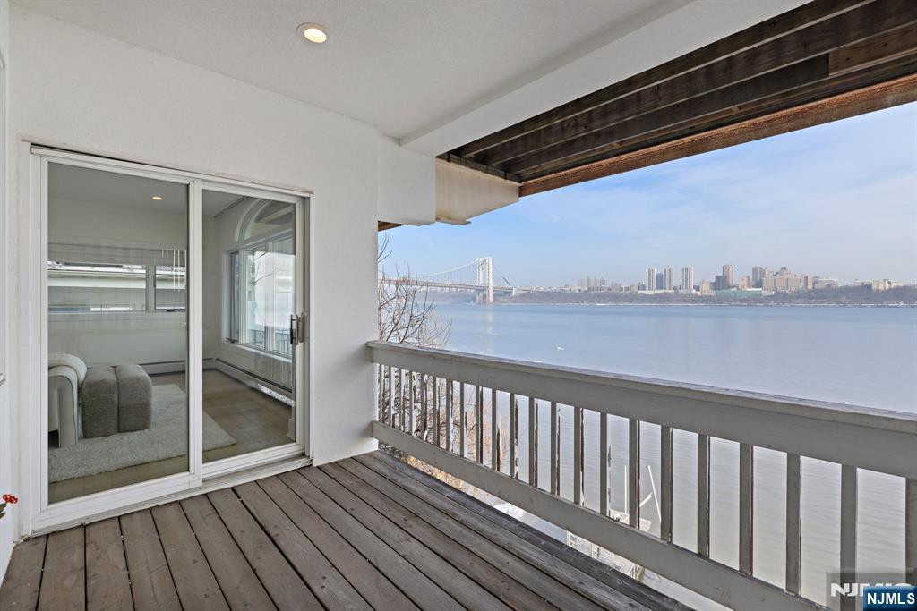 27 Shore Road Edgewater, NJ 07020 - Photo 28 of 48 a view of balcony with wooden floor