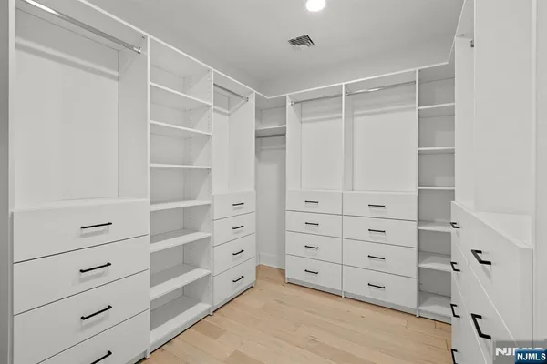 a view of an empty walk in closet