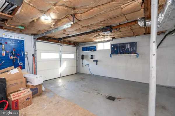 a view of a room with wooden walls
