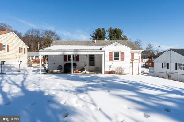 a front view of a house with a porch