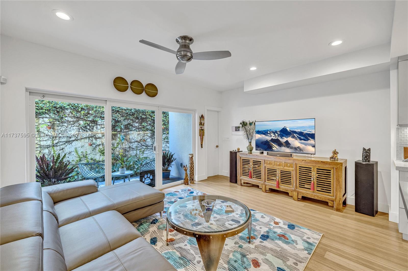 3701 Solana Road Miami, FL 33133 - Photo 16 of 38 a living room with furniture and a window