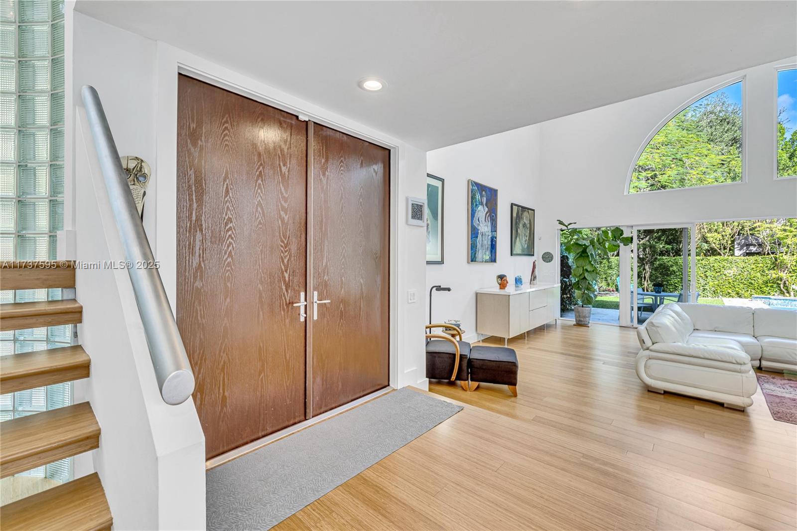 3701 Solana Road Miami, FL 33133 - Photo 19 of 38 a living room with furniture and a large window