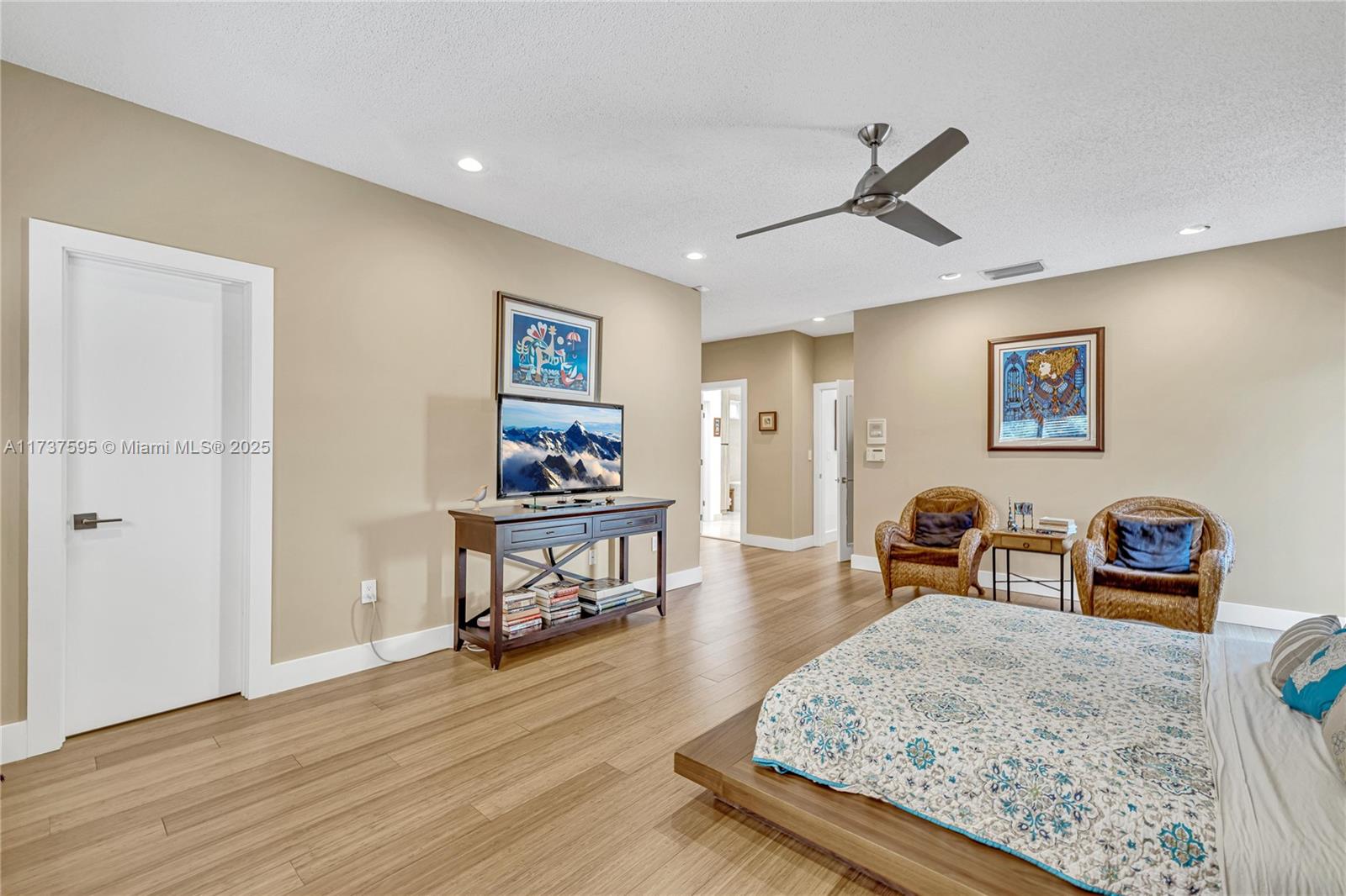 3701 Solana Road Miami, FL 33133 - Photo 21 of 38 a living room with furniture and a wooden floor