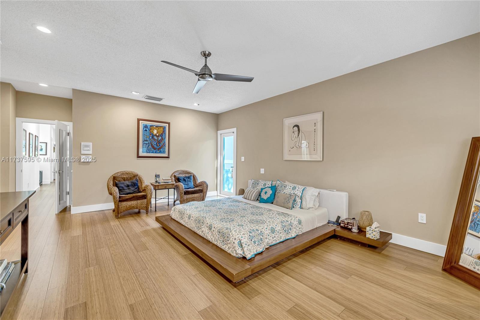 3701 Solana Road Miami, FL 33133 - Photo 22 of 38 a living room with furniture and a wooden floor