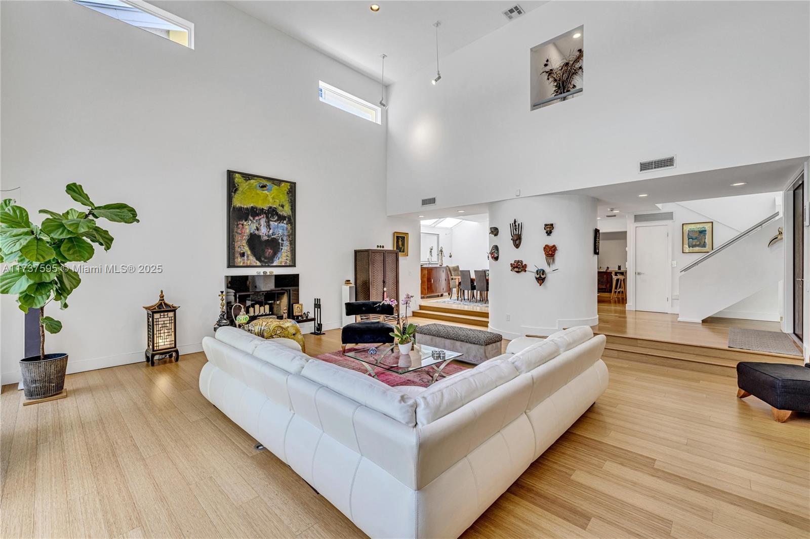 3701 Solana Road Miami, FL 33133 - Photo 33 of 38 a living room with furniture and a large window