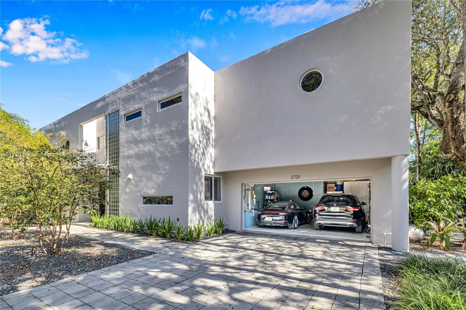 3701 Solana Road Miami, FL 33133 - Photo 34 of 38 a view of a car in front of a building