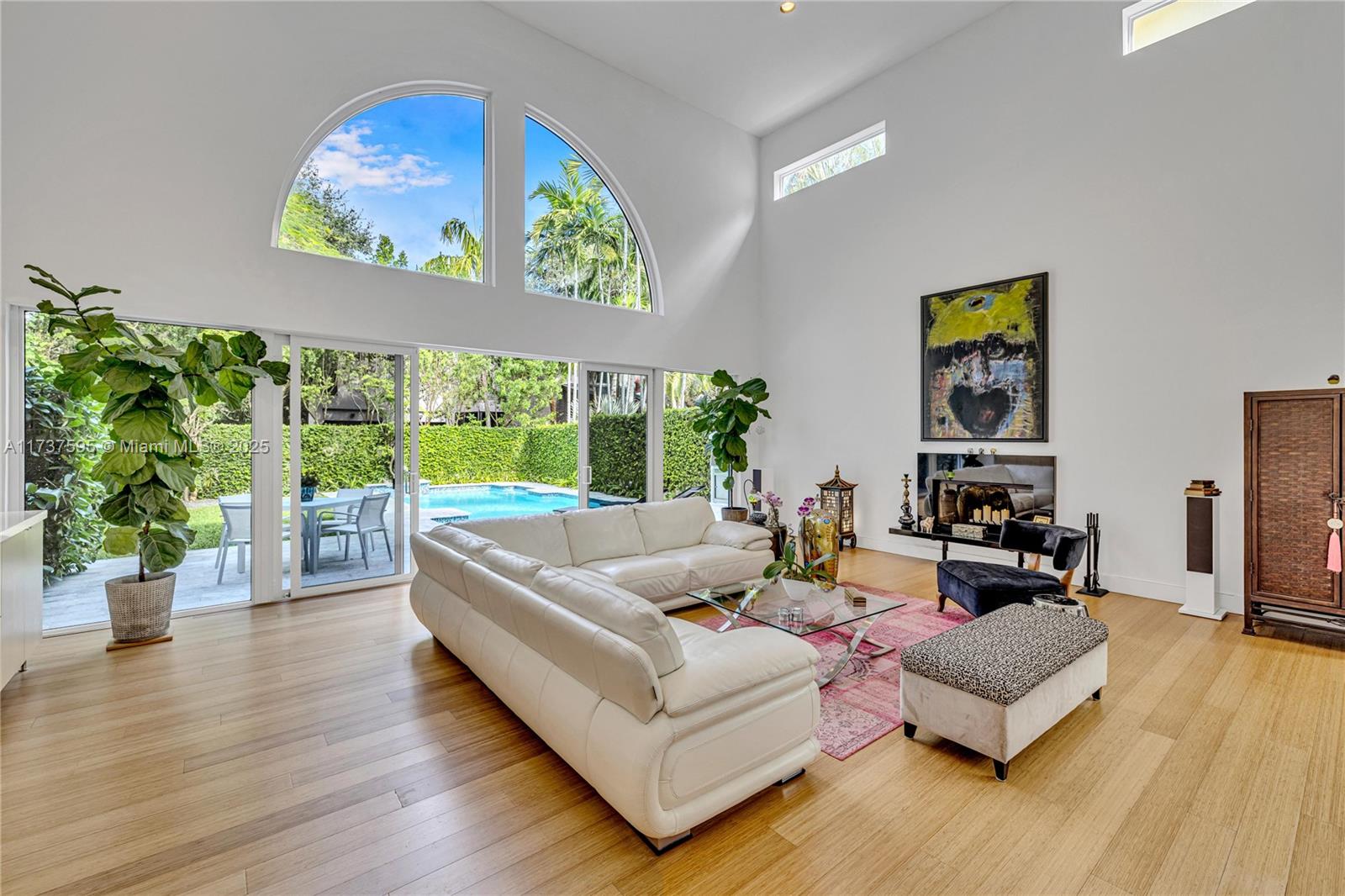 3701 Solana Road Miami, FL 33133 - Photo 4 of 38 a living room with furniture and a large window