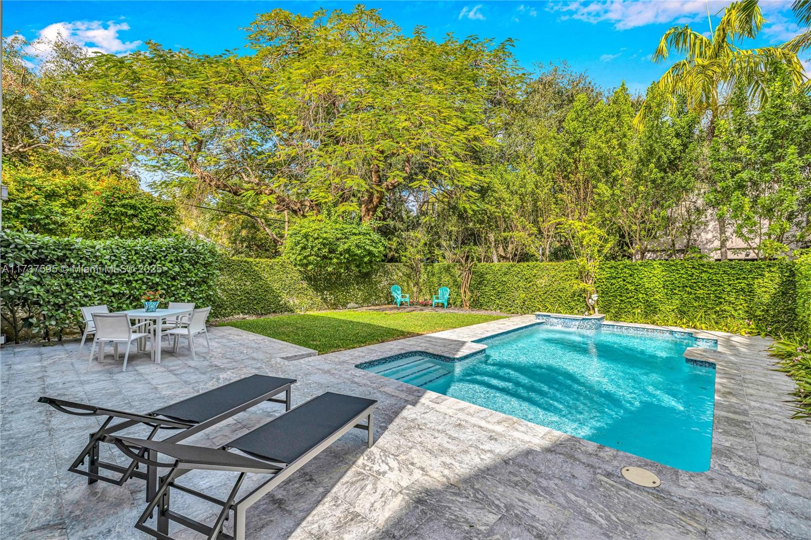 3701 Solana Road Miami, FL 33133 - Photo 10 of 38 a view of a swimming pool with a patio