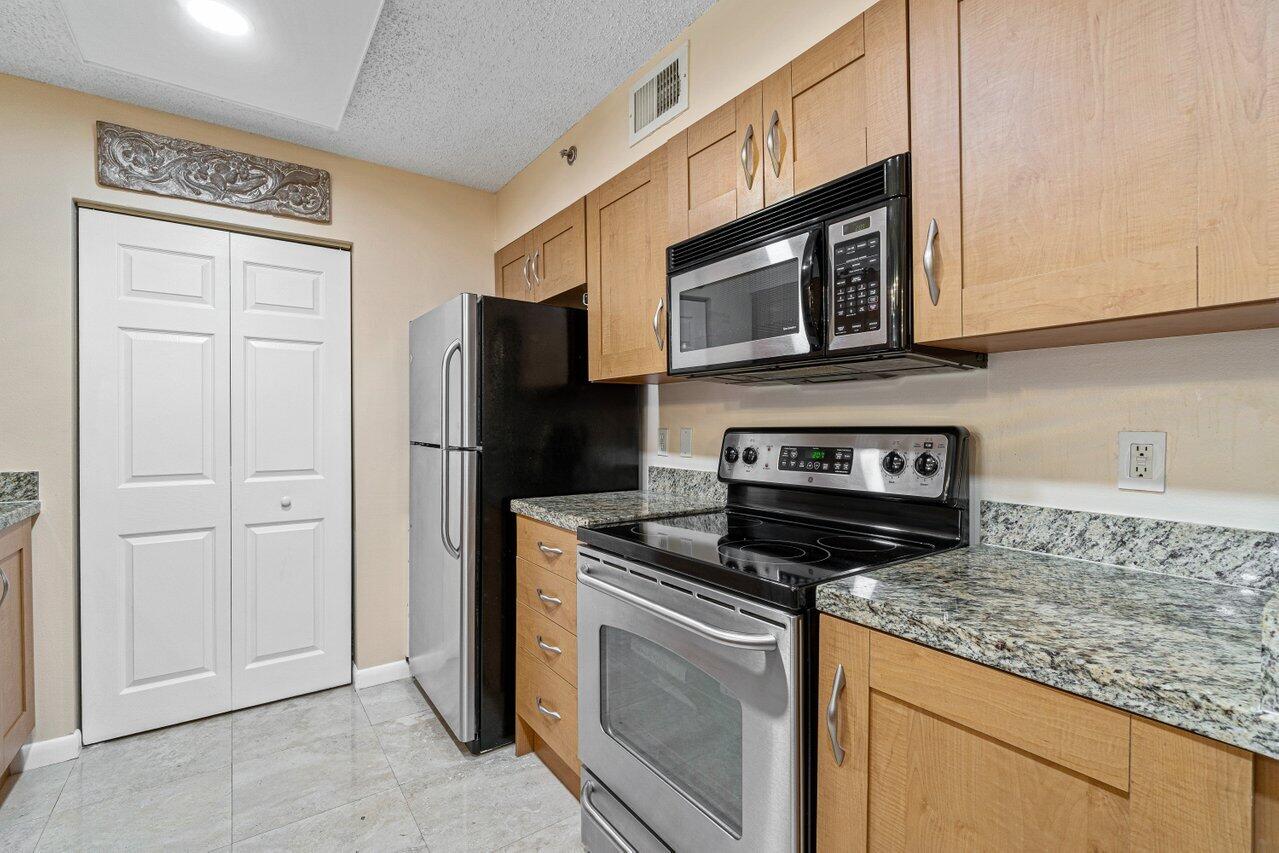 3151 Clint Moore Road, Unit 104 Boca Raton, FL 33496 - Photo 12 of 38 09877-