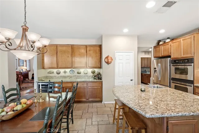 a bedroom with a bed potted plant and a window