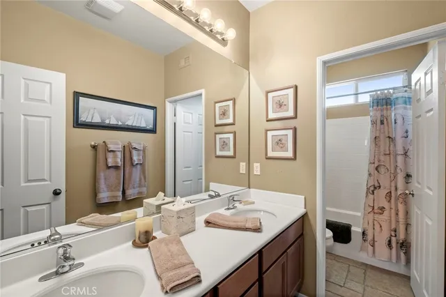 a bedroom with a bed furniture and a window