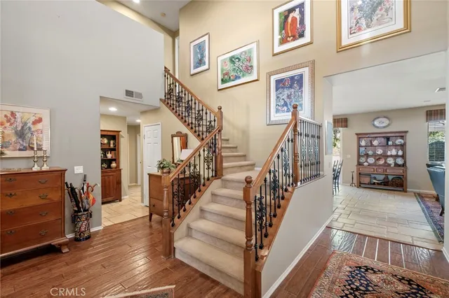 a view of entryway with stairs and furniture