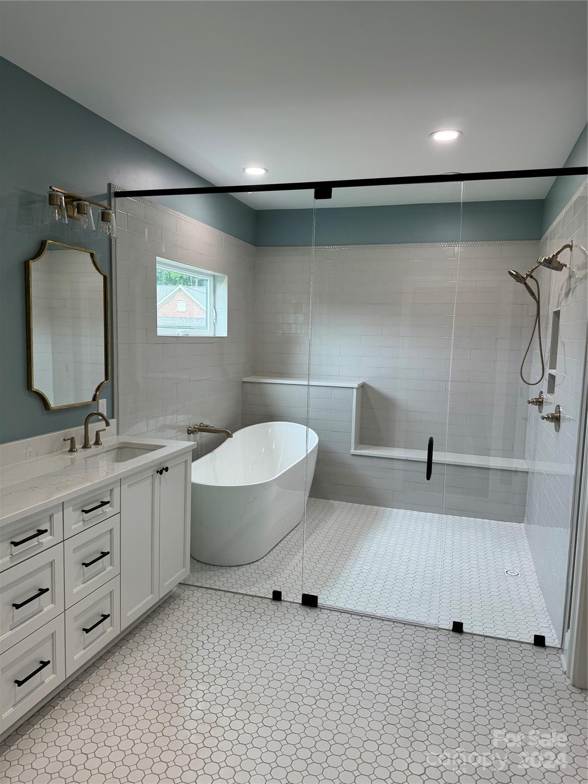 4305 Holly Circle Northeast Conover, NC 28613 - Photo 18 of 36 a bathroom with a toilet sink and mirror