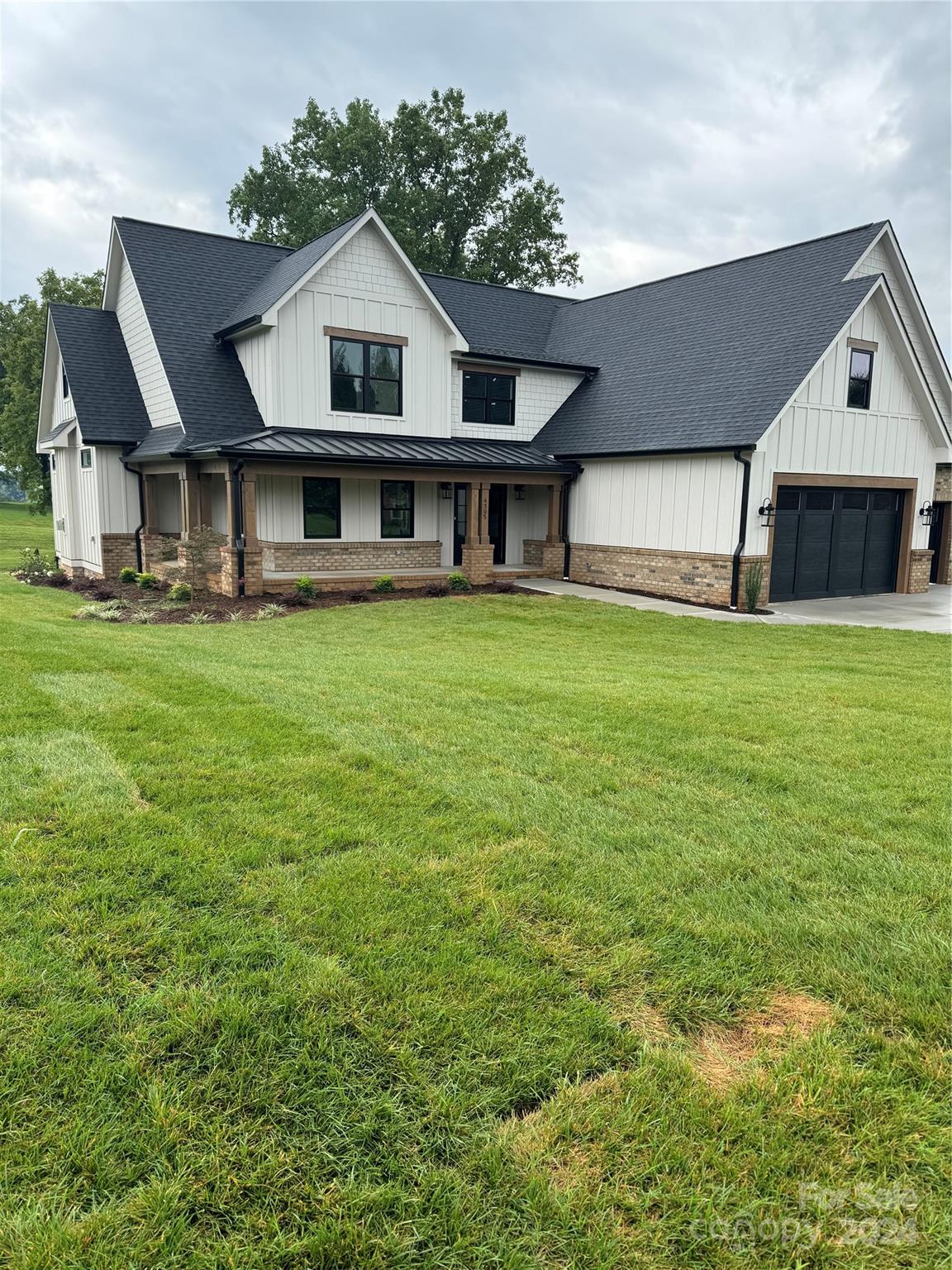 4305 Holly Circle Northeast Conover, NC 28613 - Photo 22 of 36 a view of a house with a big yard and large trees