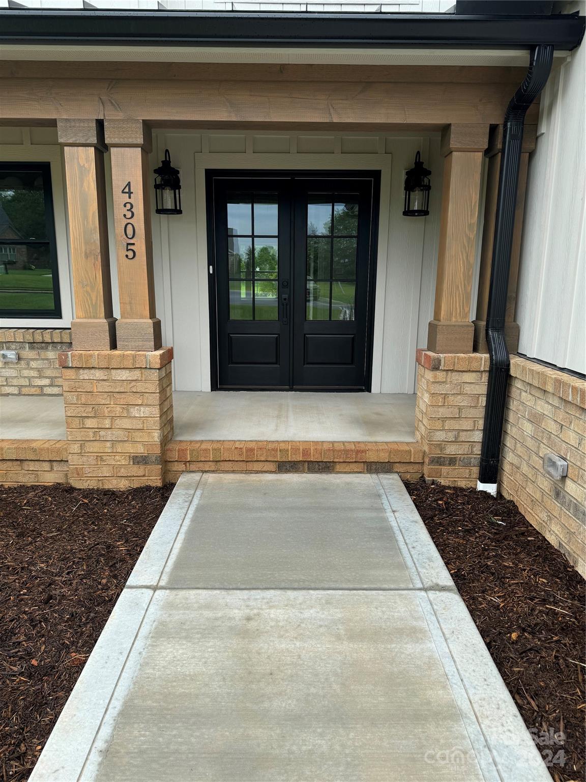 4305 Holly Circle Northeast Conover, NC 28613 - Photo 3 of 36 a view of a brick house with a large window