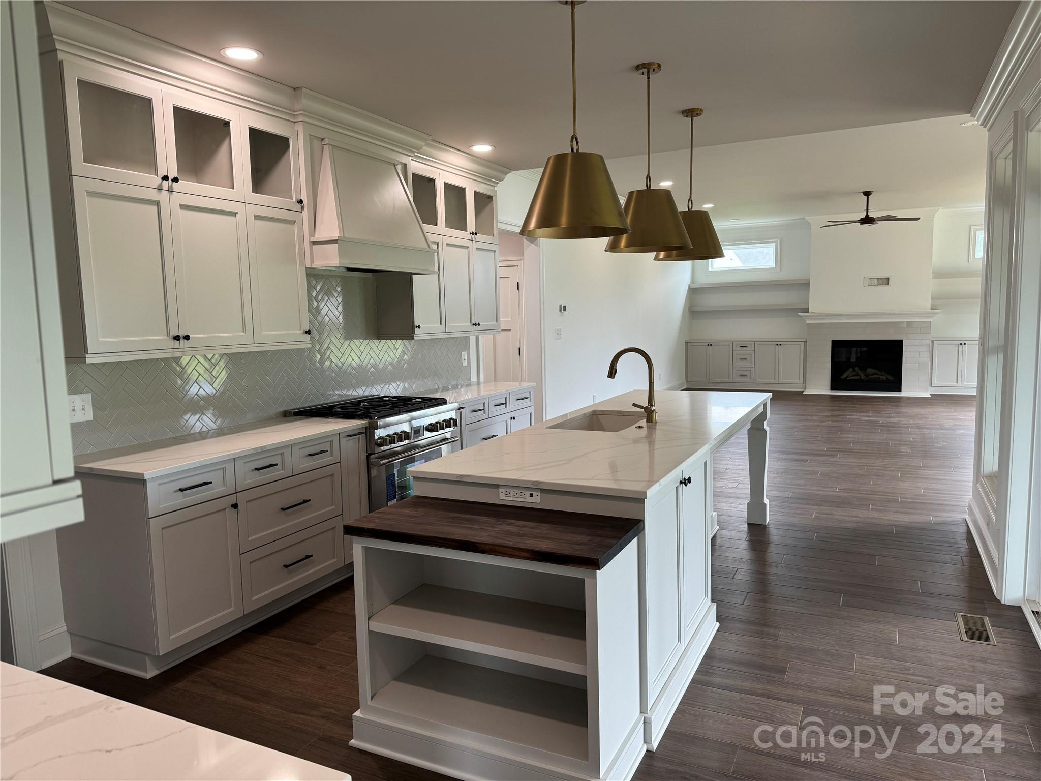 4305 Holly Circle Northeast Conover, NC 28613 - Photo 5 of 36 a kitchen with stainless steel appliances granite countertop a stove and a sink