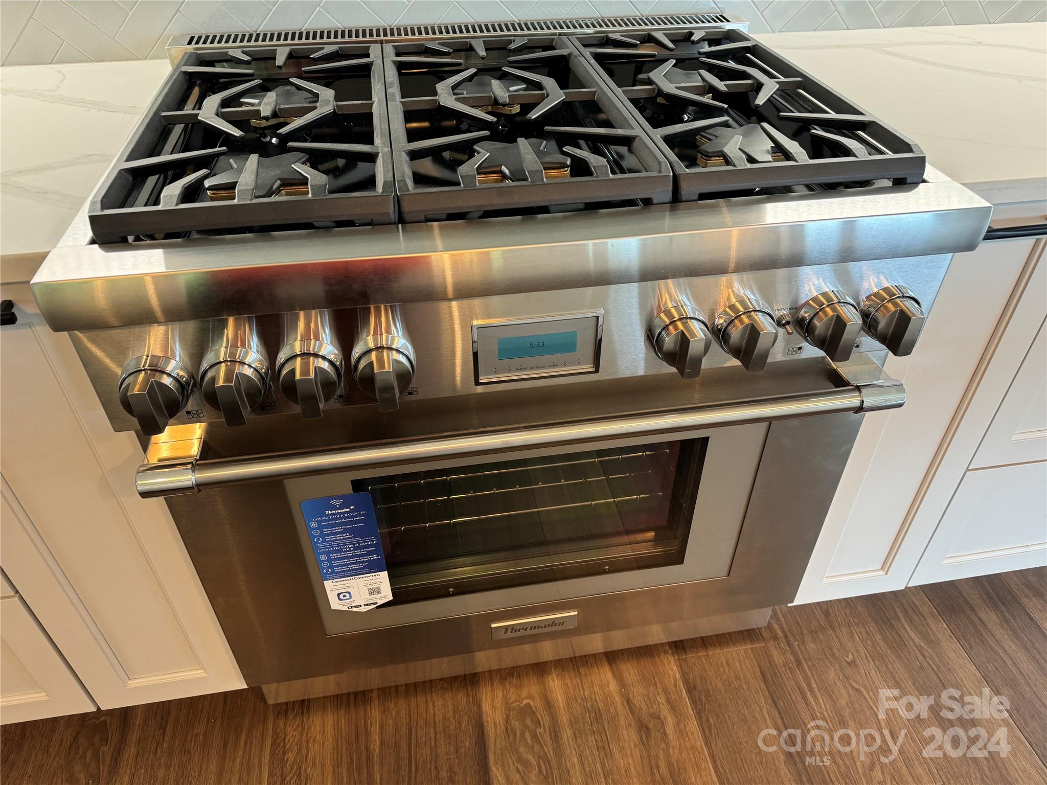 4305 Holly Circle Northeast Conover, NC 28613 - Photo 6 of 36 a close view of a stove and a microwave