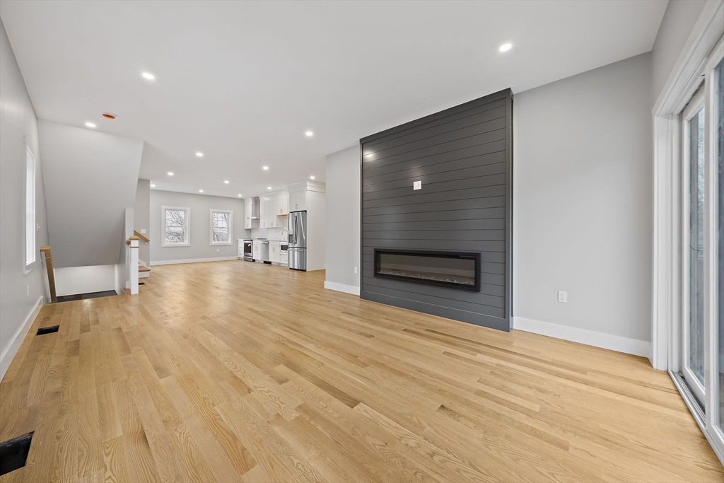 77 Neponset Street, Unit 77 Canton, MA 02021 - Photo 10 of 28 a view of empty room with wooden floor