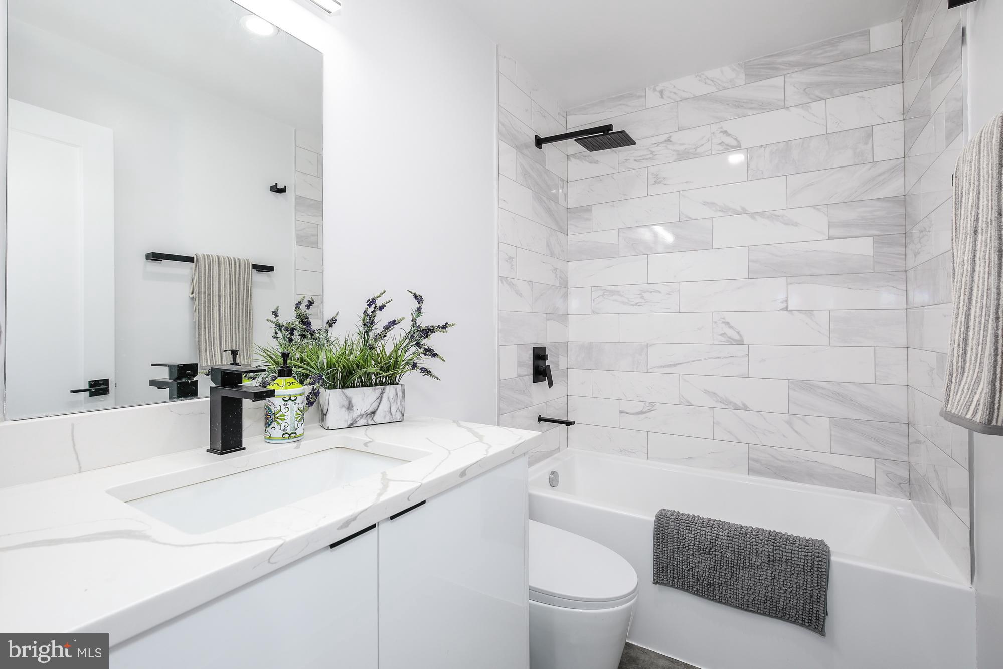 1019 17th Place Northeast, Unit 101 Washington, DC 20002 - Photo 6 of 10 New full bath