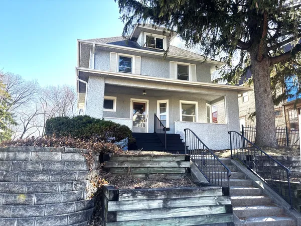 a kitchen with stainless steel appliances a sink cabinets and a counter top space