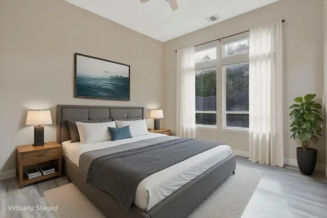 a bathroom with a sink and a window