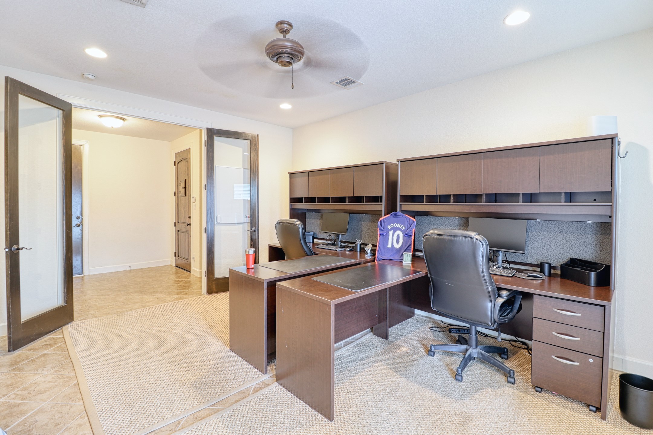 904 Patterson Street Houston, TX 77007 - Photo 20 of 30 a view of a workspace with furniture and a window