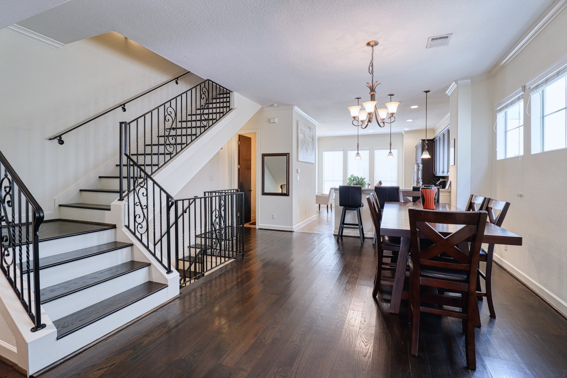 904 Patterson Street Houston, TX 77007 - Photo 6 of 30 a view of a dining room with furniture window and wooden floor