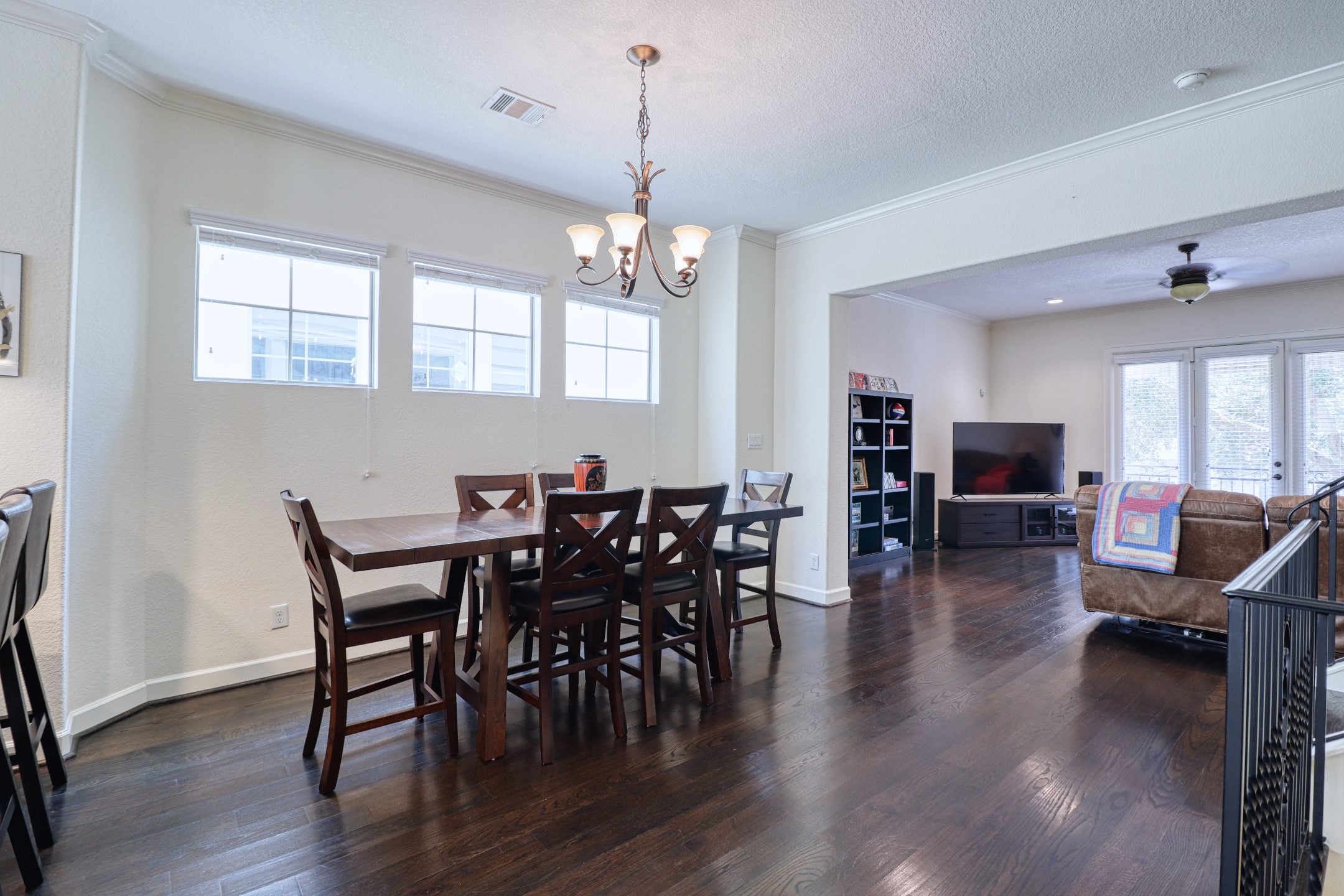 904 Patterson Street Houston, TX 77007 - Photo 8 of 30 a view of a dining room with furniture window and wooden floor