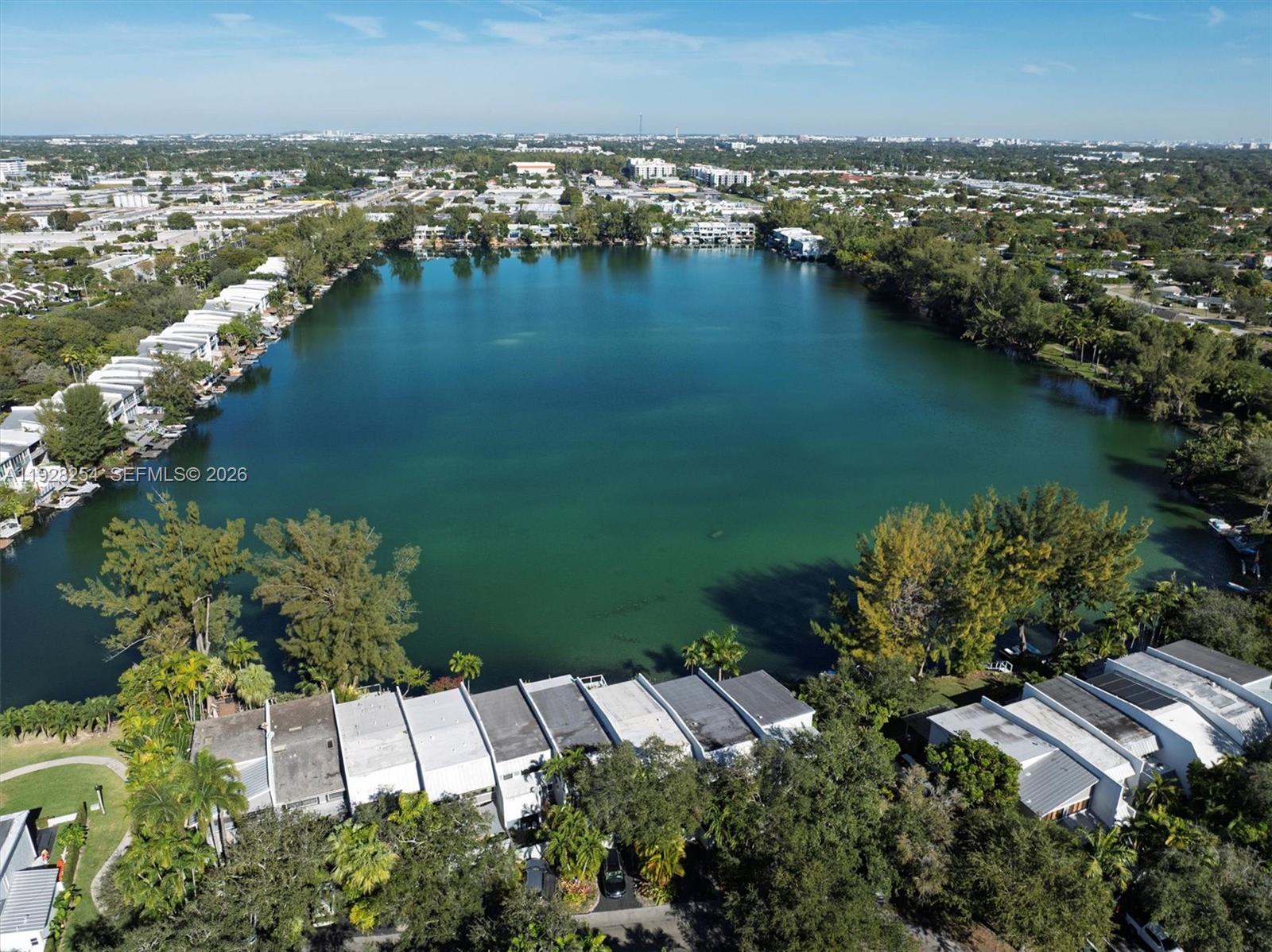7043 Southwest 53rd Lane Miami, FL 33155 - Photo 1 of 41 an aerial view of residential houses with outdoor space and lake view