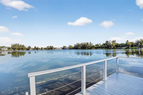 a view of a lake from a balcony