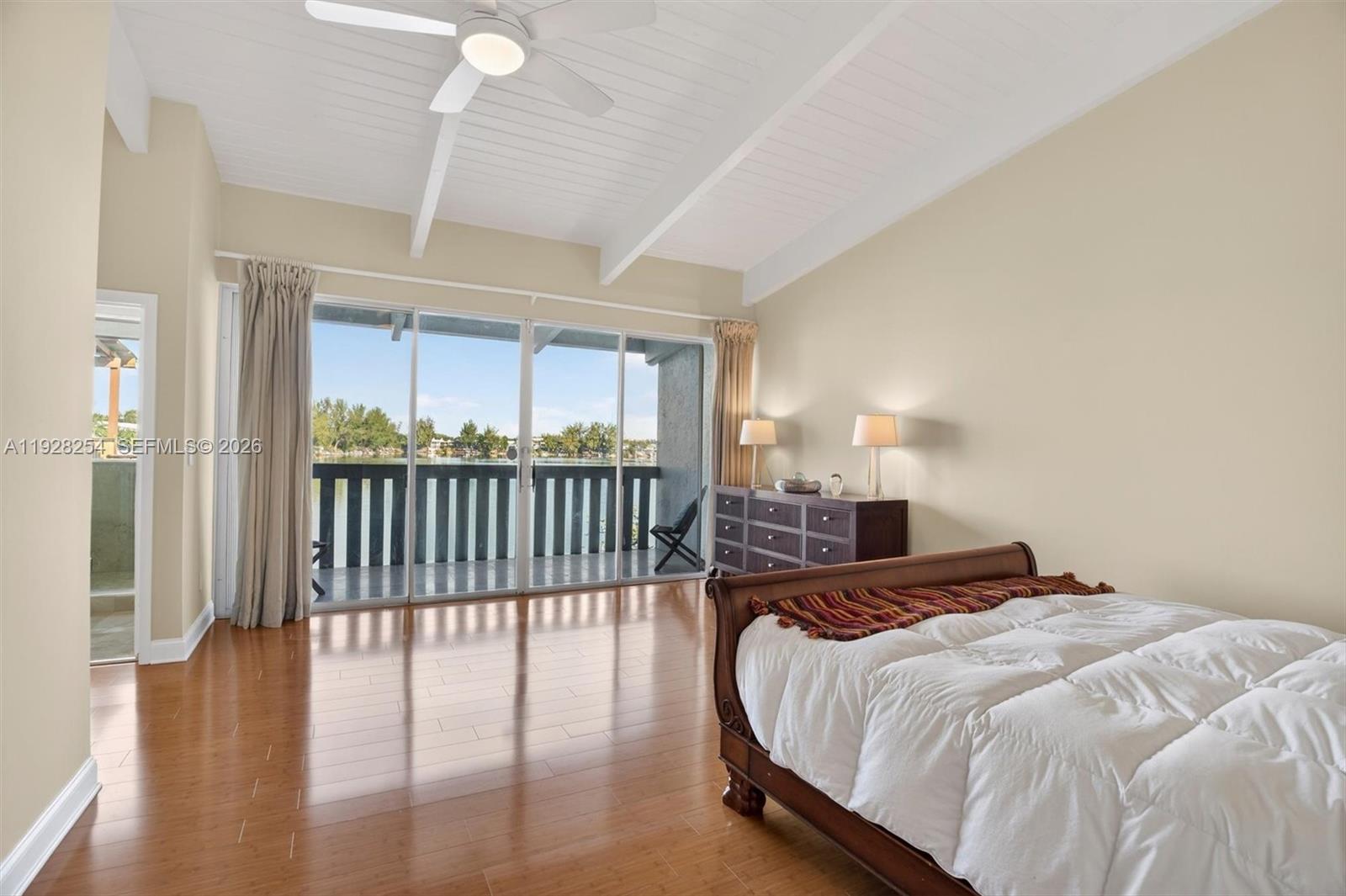 7043 Southwest 53rd Lane Miami, FL 33155 - Photo 19 of 41 a bedroom with a bed and a window