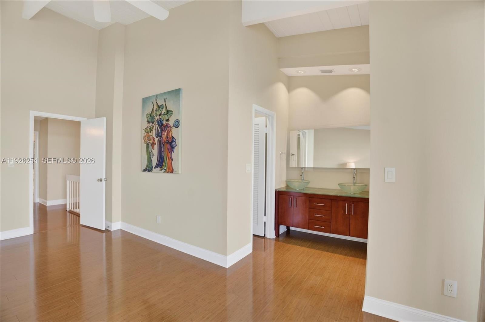 7043 Southwest 53rd Lane Miami, FL 33155 - Photo 20 of 41 a view of a room with wooden floor and cabinet