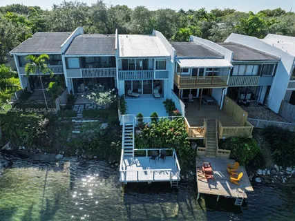 a aerial view of a house with swimming pool